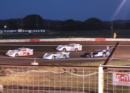 Night photo with race cars at Off Road Speedway