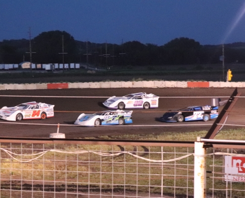 Night photo with race cars at Off Road Speedway
