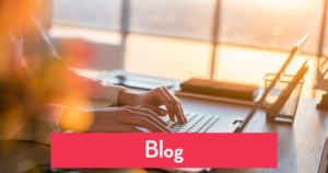 Generic photo of someone writing at a computer