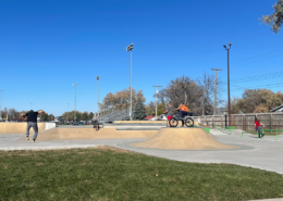 People doing tricks on bikes and skateboards at the Norfolk Skate Park